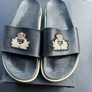 Christian Louboutin Black Slide Sandals with Embroidered Crest